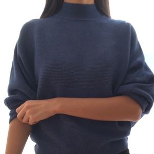 Blue sweater with mock neck and billowy arms